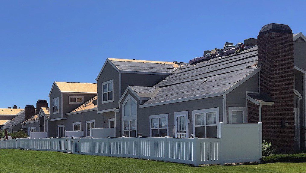 multi-family building roofing installation Denver, CO